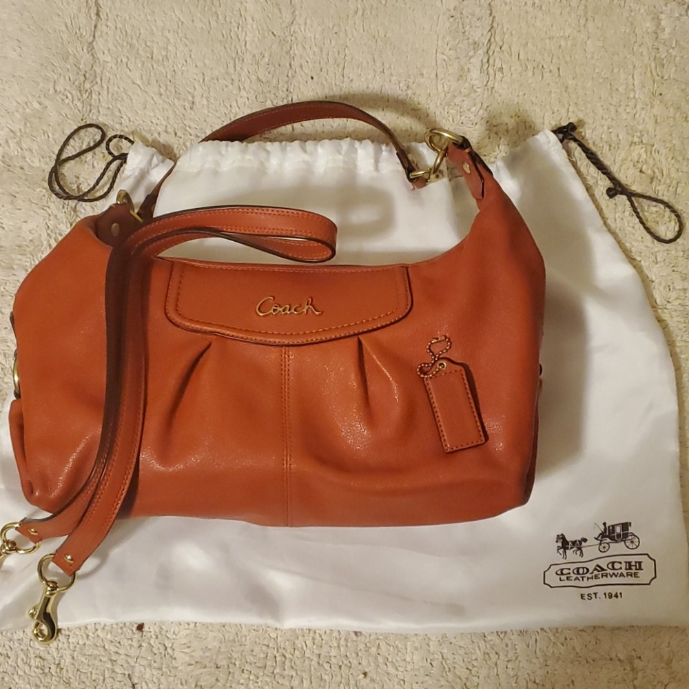 Genuine Rust Coach leather purse/crossbody.
